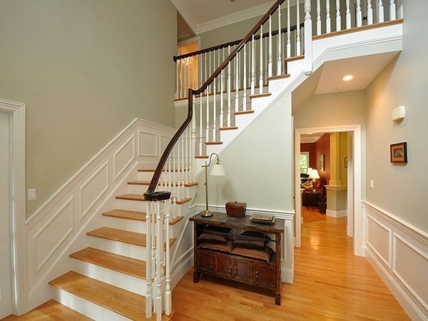 81 Montvale Road Weston, MA 02493 - Photo 6 of 27 a view of entryway and hall with wooden floor