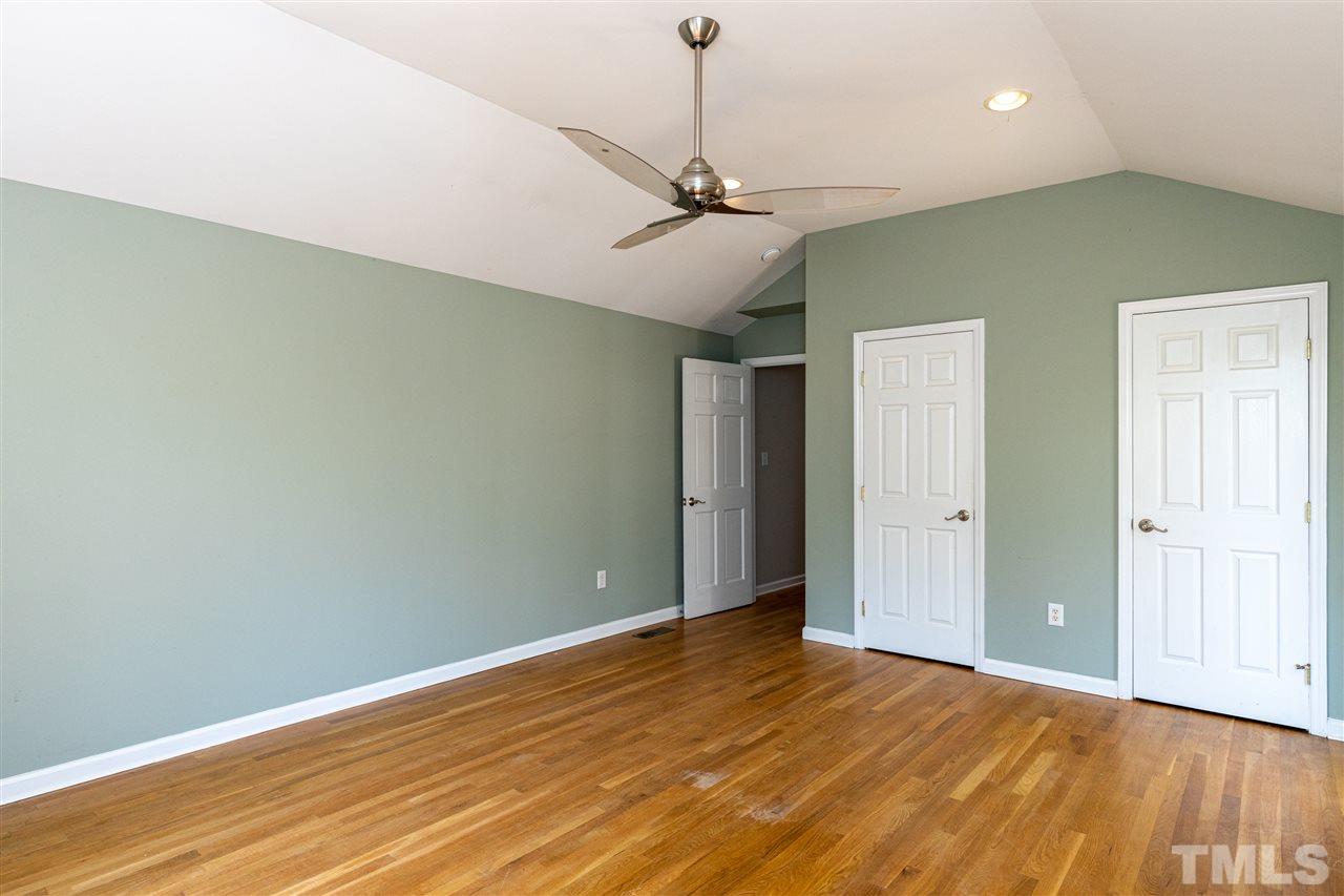 2620 Patrick Road Raleigh, NC 27604 - Photo 22 of 30 a view of an empty room with wooden floor