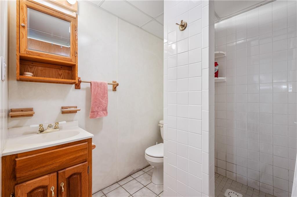 1178 Freeport Road Kittanning, PA 16201 - Photo 20 of 25 a bathroom with a sink a toilet and shower