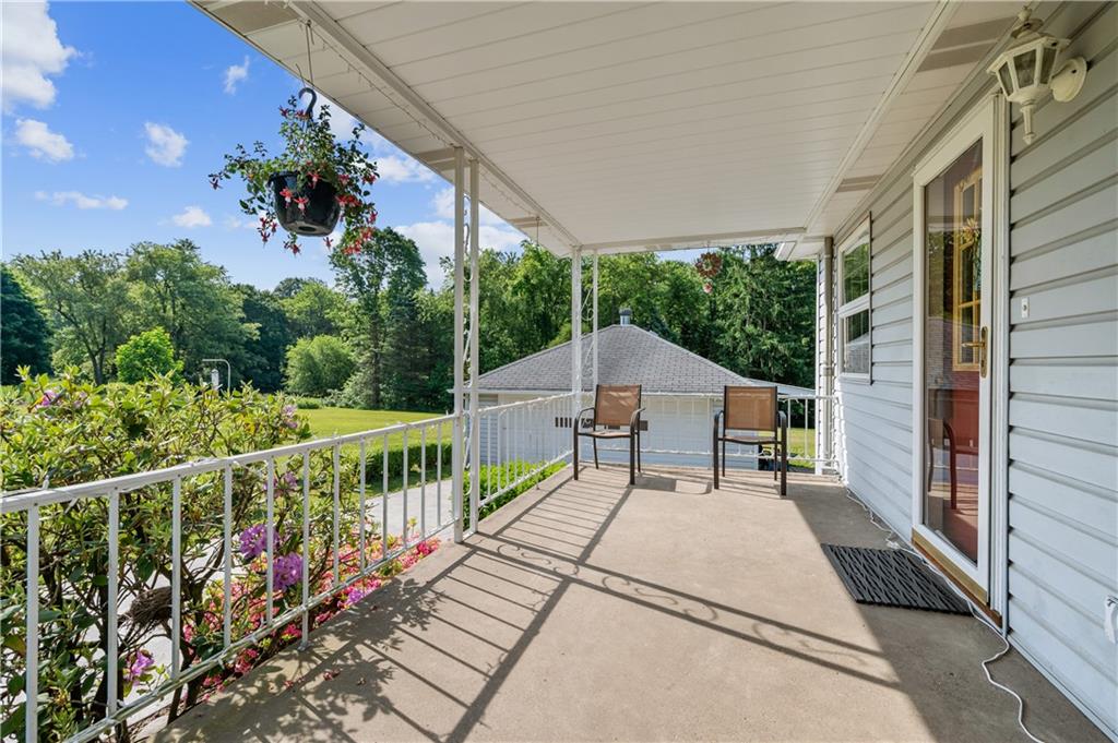 1178 Freeport Road Kittanning, PA 16201 - Photo 3 of 25 a view of a house with wooden deck and furniture