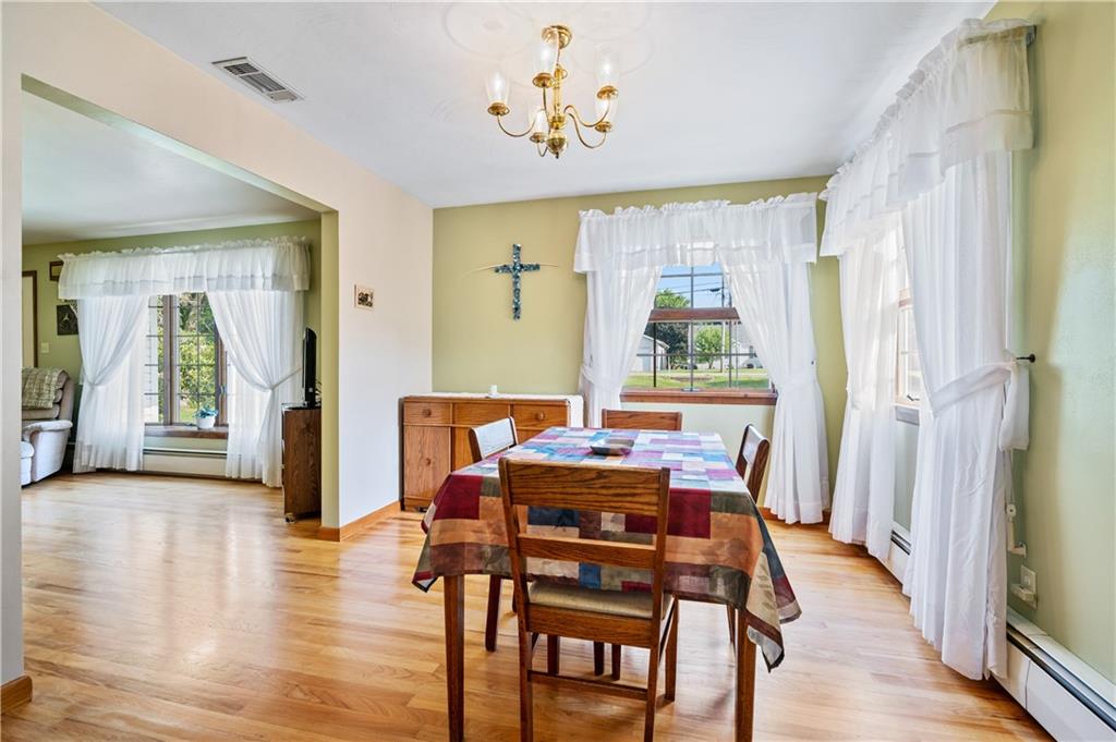 1178 Freeport Road Kittanning, PA 16201 - Photo 6 of 25 a view of a dining room with furniture window and wooden floor