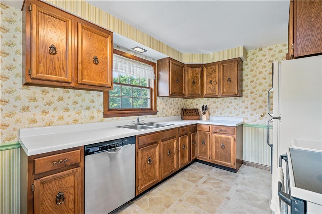 1178 Freeport Road Kittanning, PA 16201 - Photo 9 of 25 a kitchen that has a sink and a stove in it