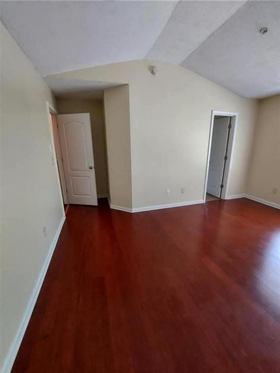 1749 Broad River Road Atlanta, GA 30349 - Photo 9 of 10 an empty room with wooden floor and closet