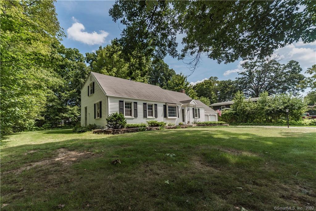 Pretty Cape with wonderful curb appeal