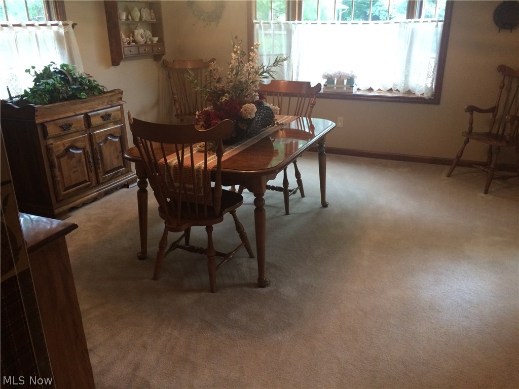 6739 Stoney Ridge Road North Ridgeville, OH 44039 - Photo 20 of 32 Formal dining room or home office has door to front porch and large bayed window - lots of light in here!
