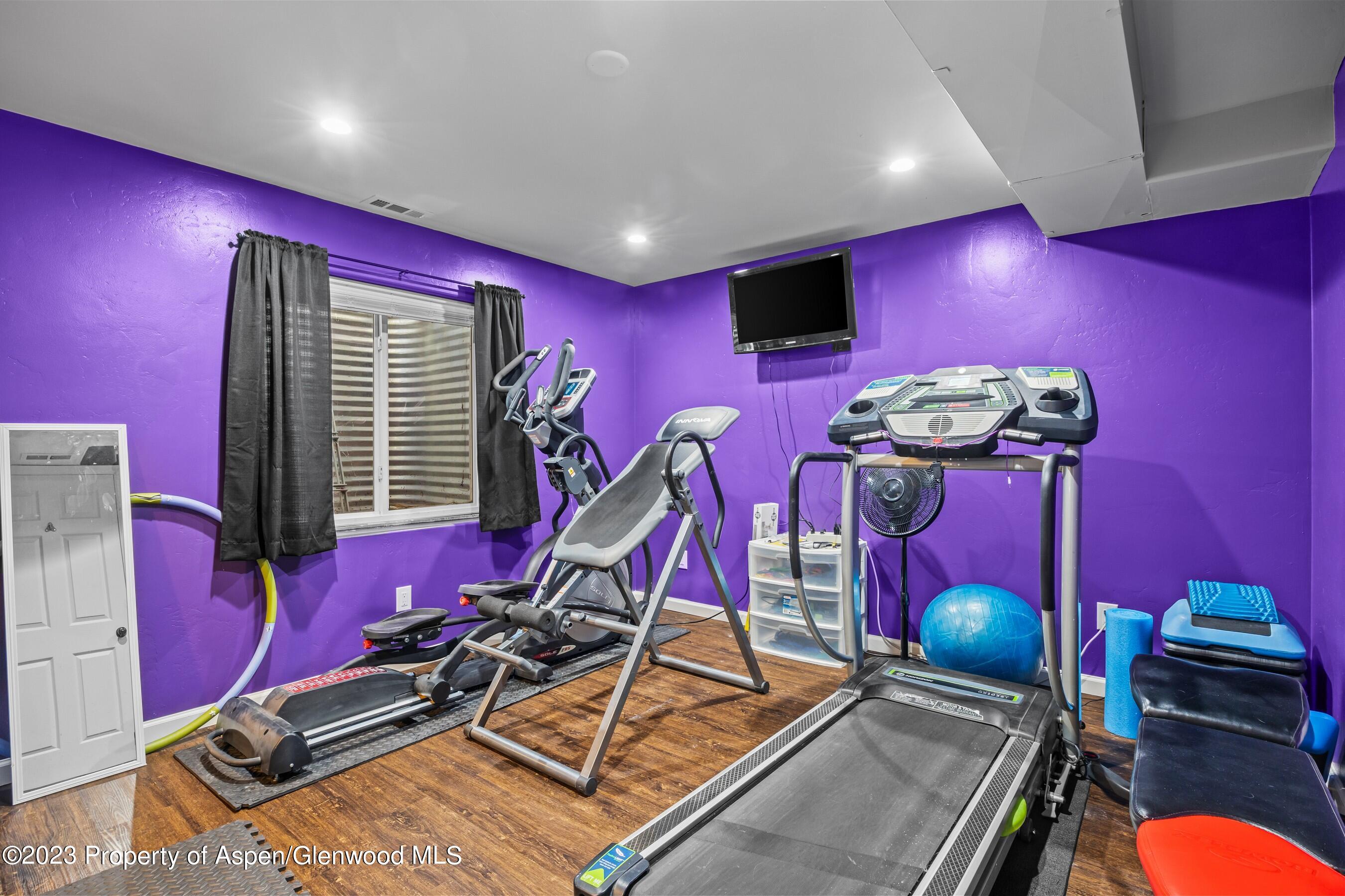 1273 East 18th Way Rifle, CO 81650 - Photo 23 of 26 a room with gym equipment