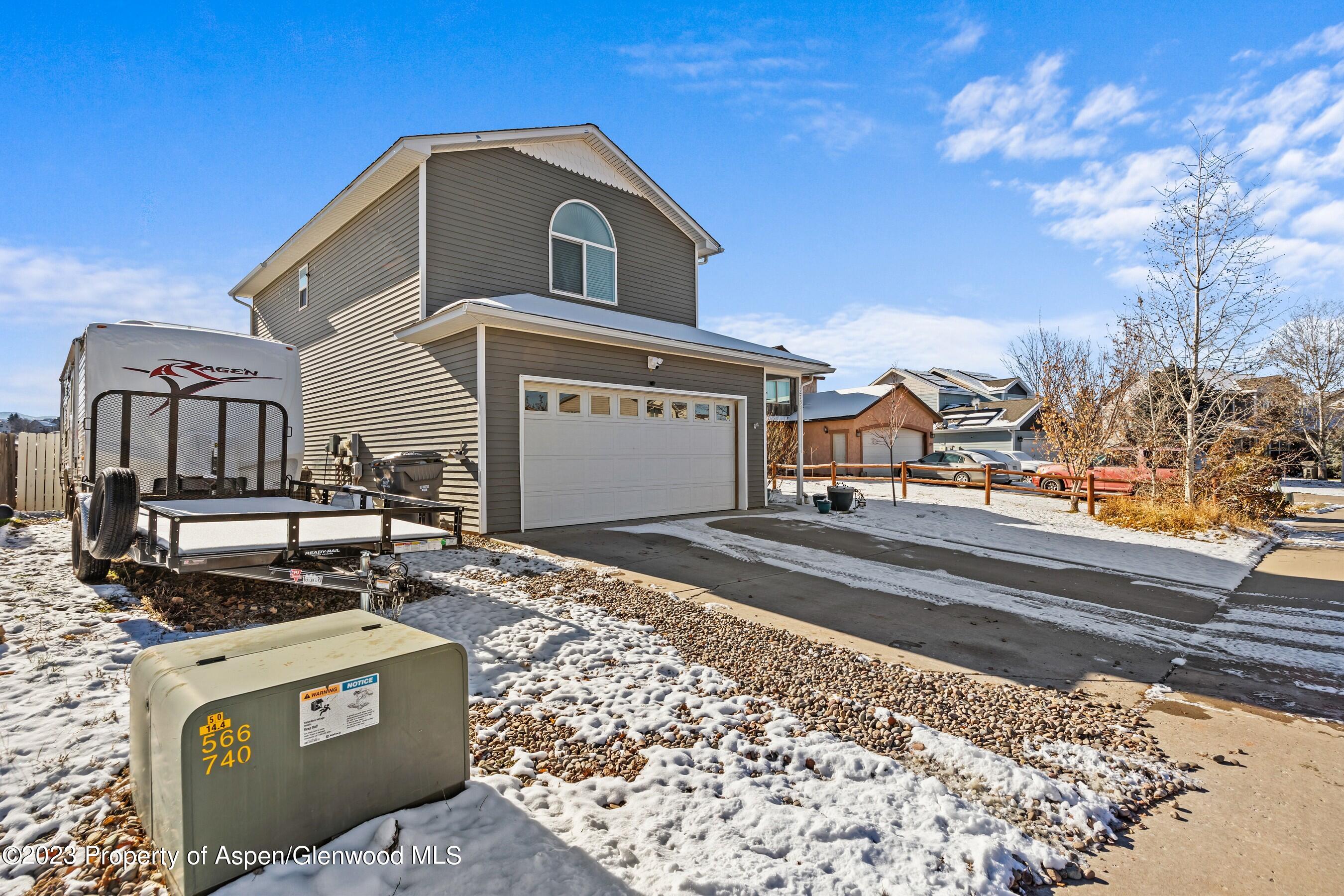 1273 East 18th Way Rifle, CO 81650 - Photo 3 of 26 a view of street with houses