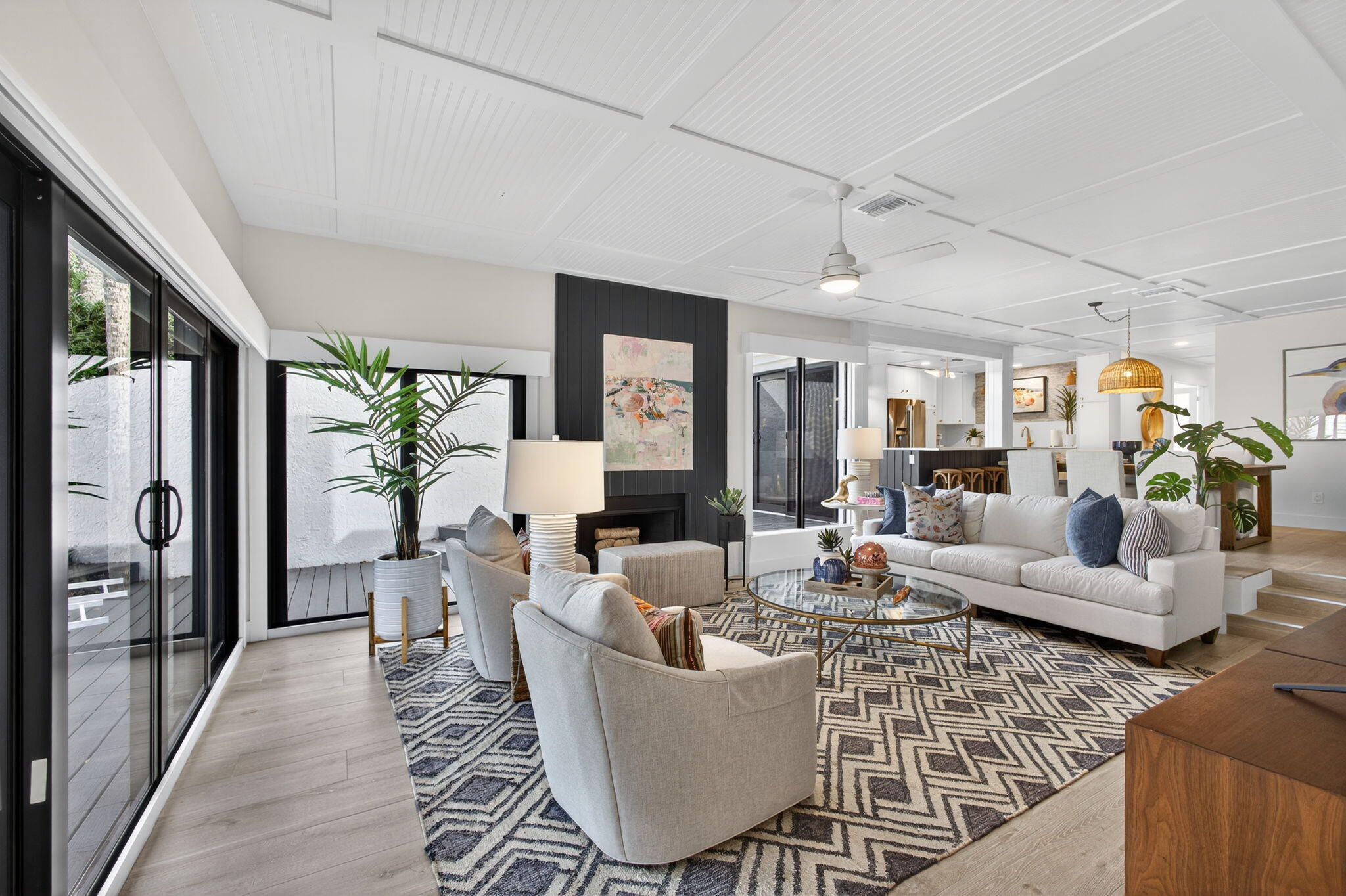 17085 Bay Street Jupiter, FL 33477 - Photo 2 of 44 a living room with furniture and a large window