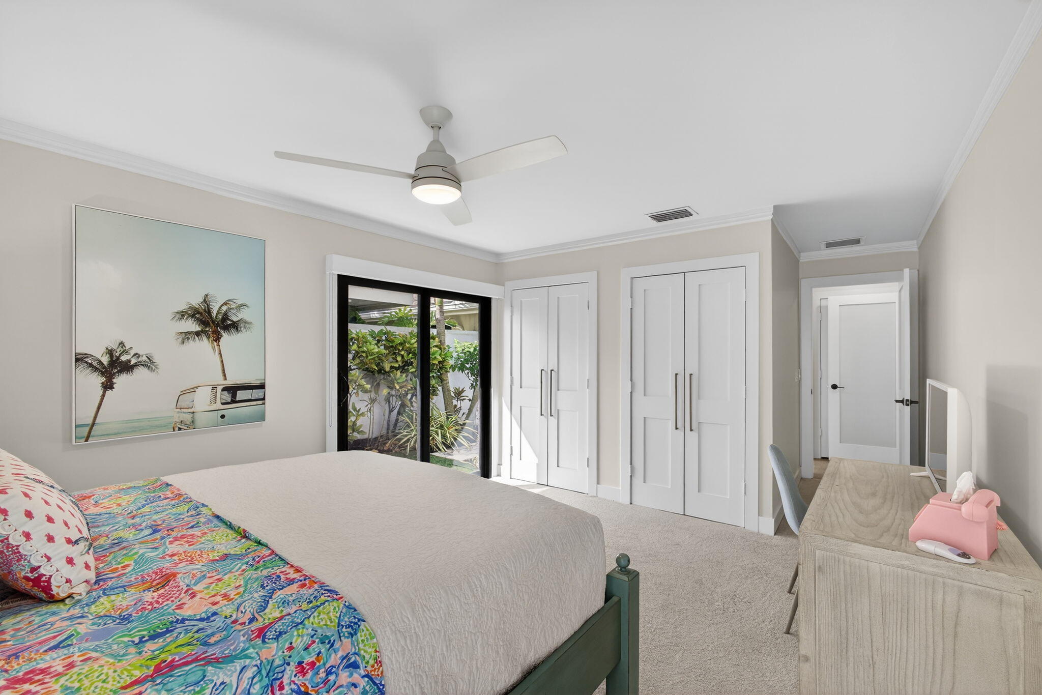 17085 Bay Street Jupiter, FL 33477 - Photo 25 of 44 a bedroom with a bed and a window