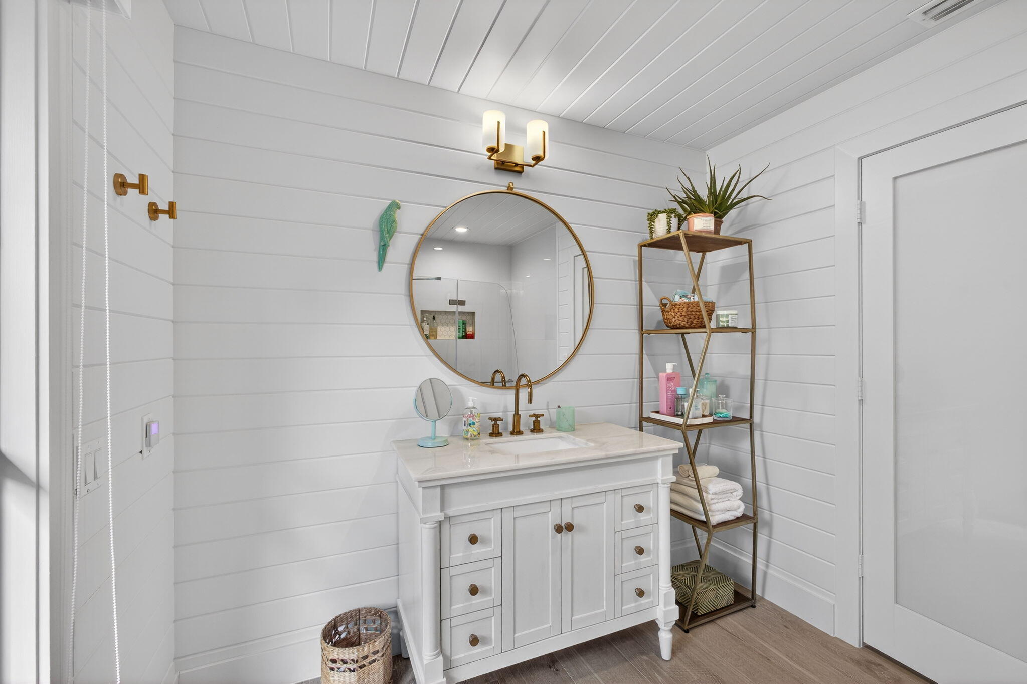 17085 Bay Street Jupiter, FL 33477 - Photo 27 of 44 a bathroom with a sink and a mirror