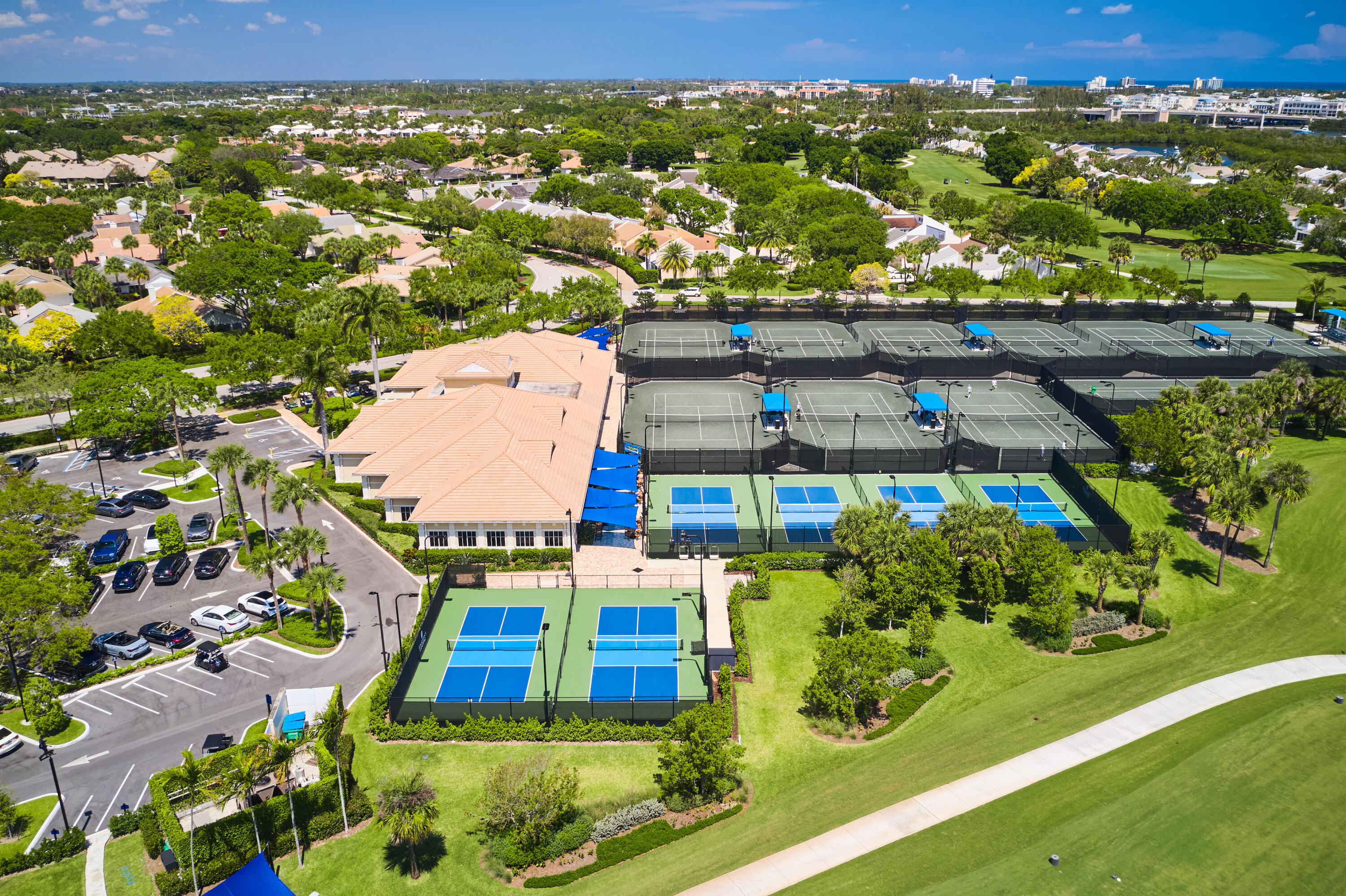 17085 Bay Street Jupiter, FL 33477 - Photo 41 of 44 an aerial view of residential houses with outdoor space and swimming pool