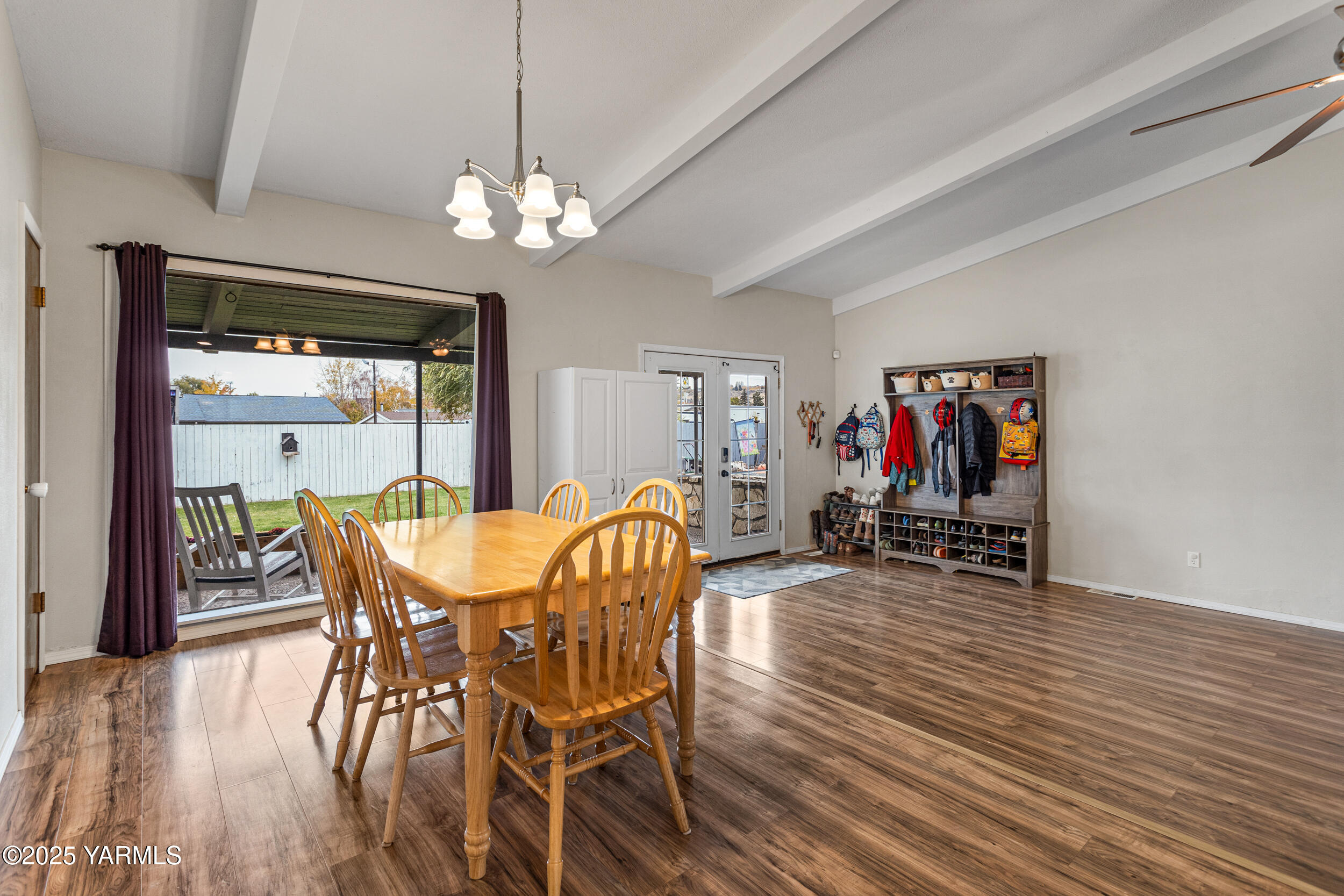 31 Link Road Naches, WA 98937 - Photo 8 of 35 a view of a dining room with furniture wooden floor and a chandelier