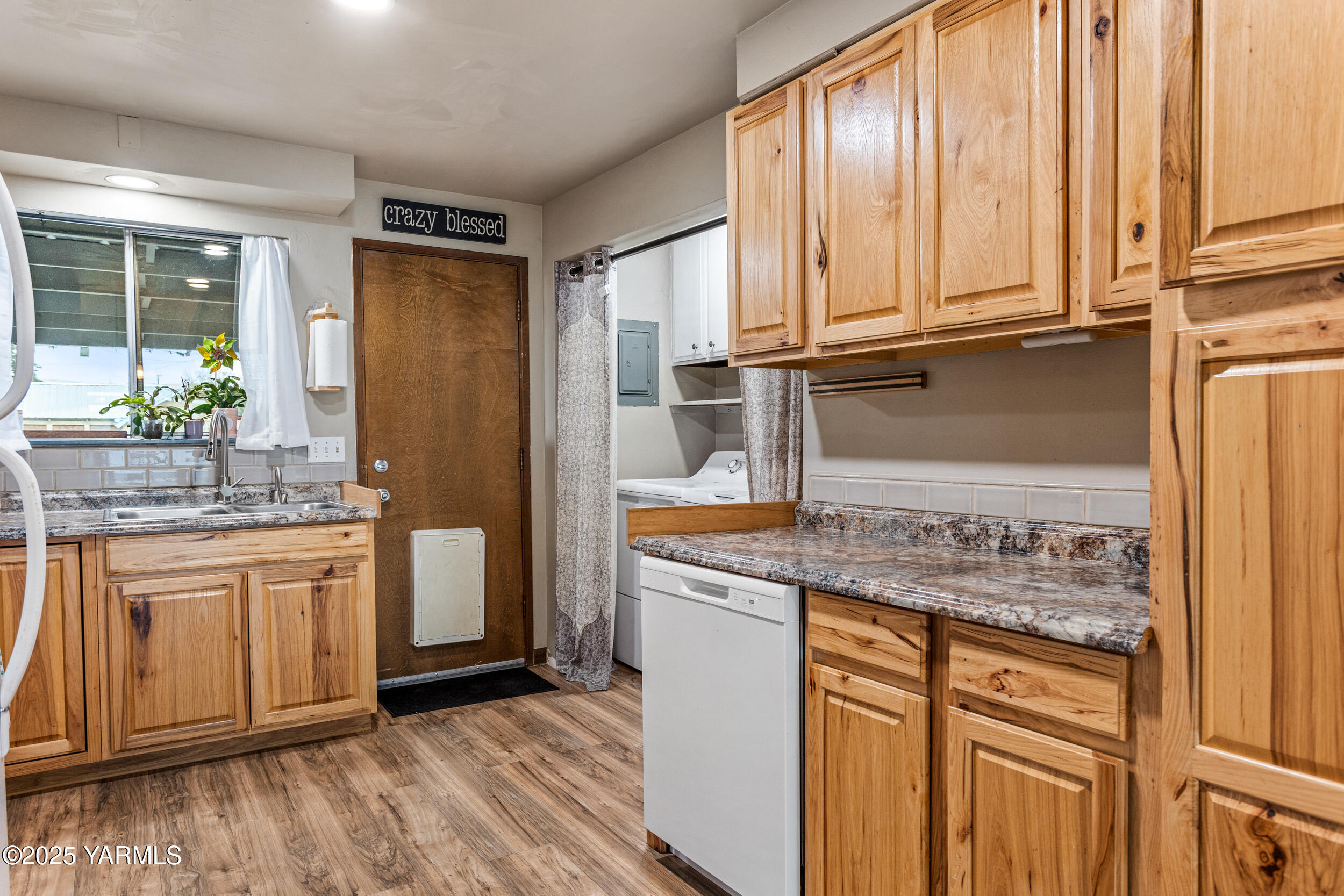 31 Link Road Naches, WA 98937 - Photo 10 of 35 a kitchen with stainless steel appliances granite countertop a refrigerator and cabinets