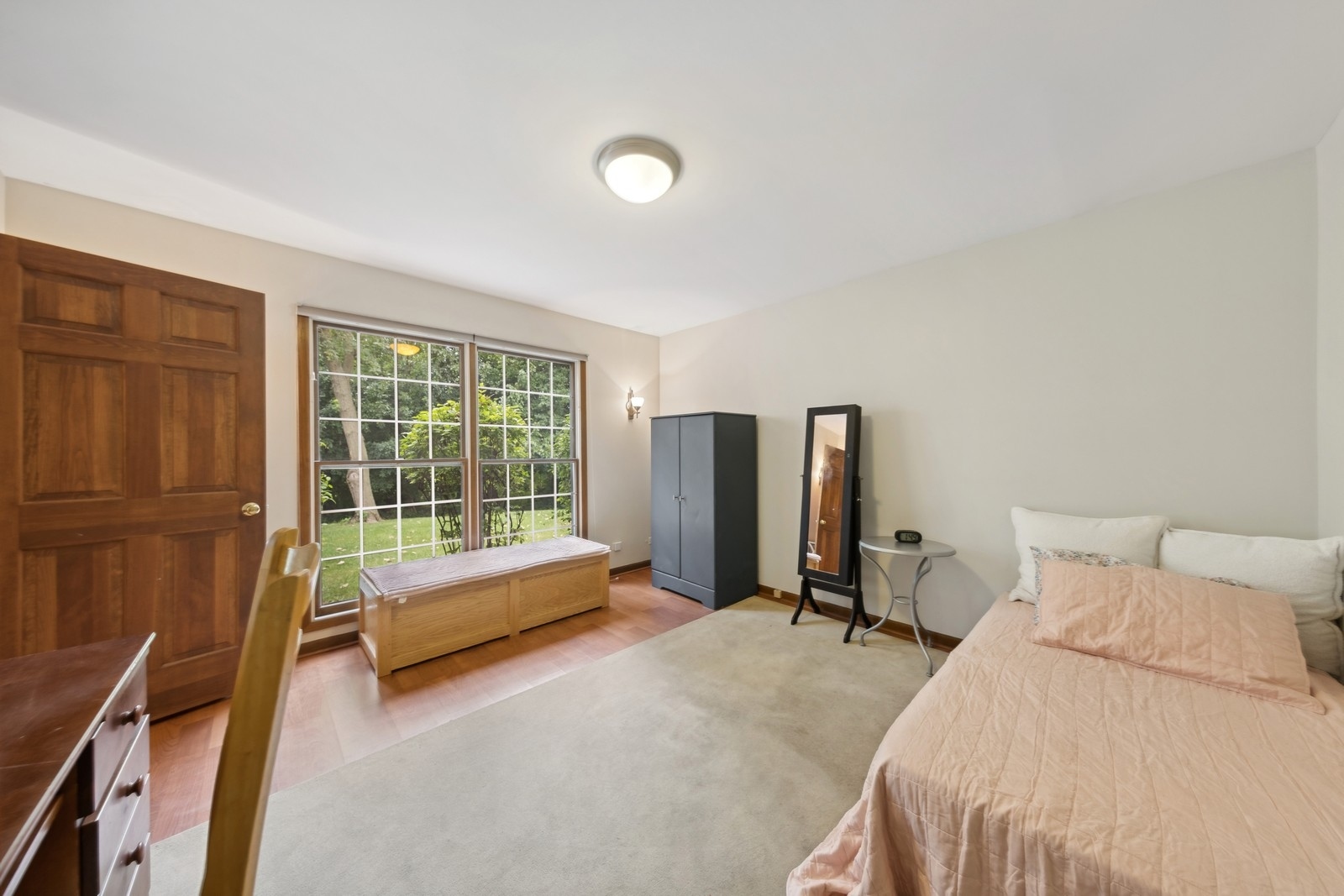 1531 Pinehurst Drive Darien, IL 60561 - Photo 12 of 38 a bedroom with a bed and large window