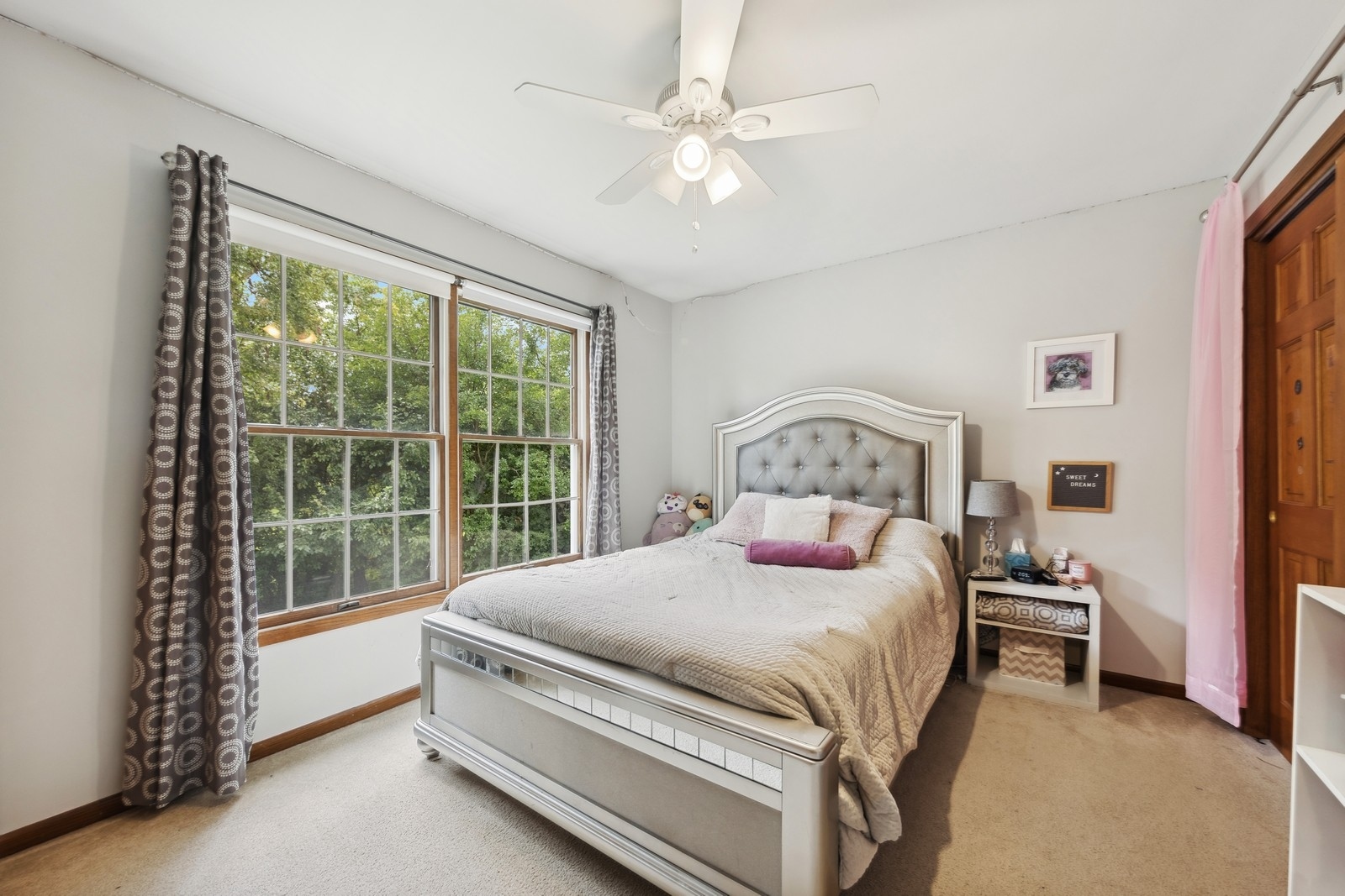 1531 Pinehurst Drive Darien, IL 60561 - Photo 19 of 38 a bedroom with a bed and a window