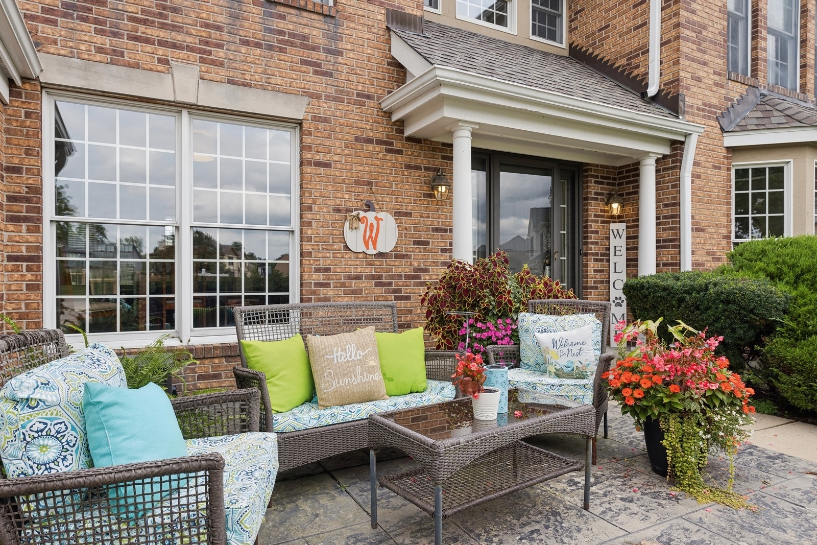 1531 Pinehurst Drive Darien, IL 60561 - Photo 2 of 38 a view of a patio with couches table and chairs and potted plants