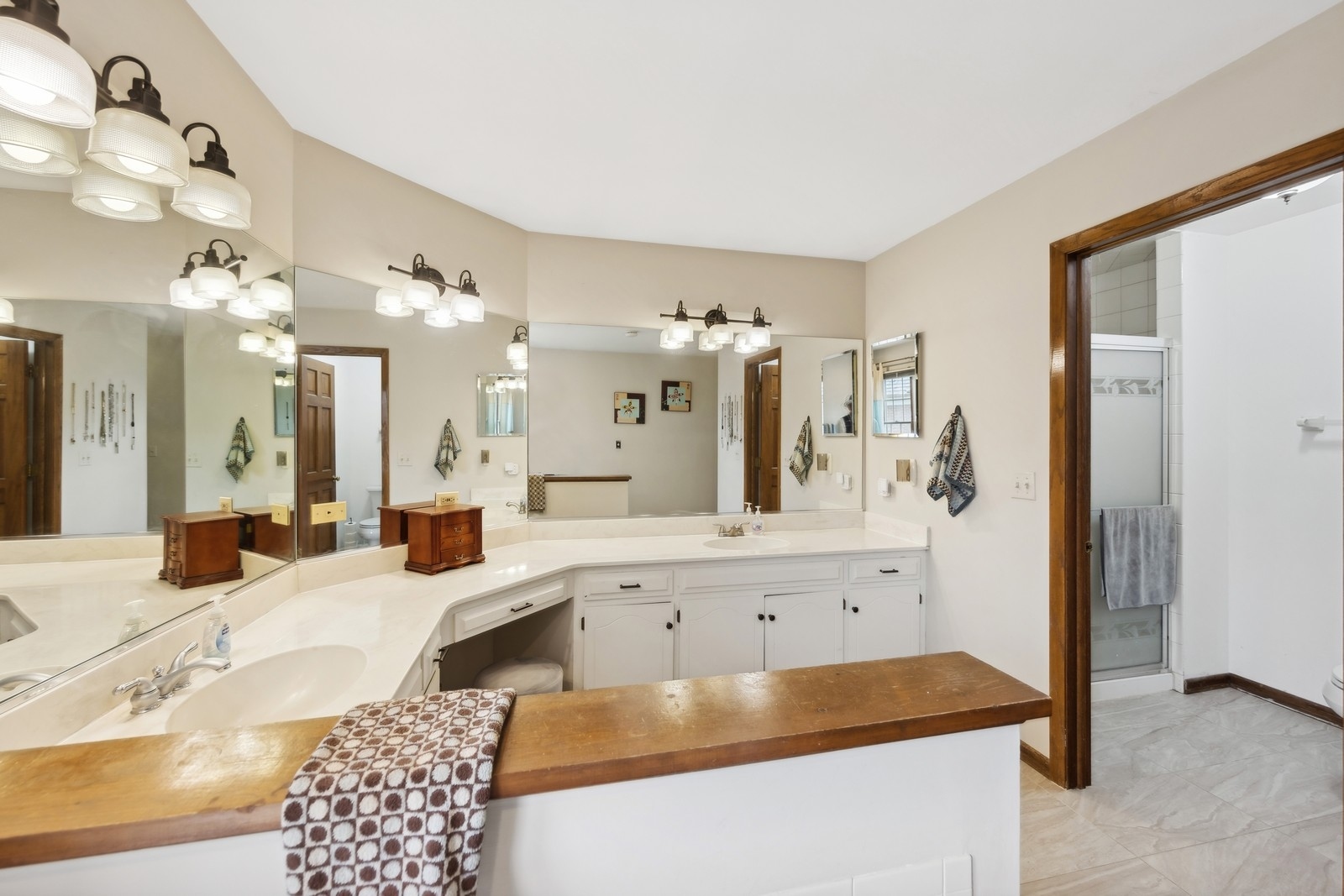 1531 Pinehurst Drive Darien, IL 60561 - Photo 24 of 38 a large white kitchen with a large counter top and sink