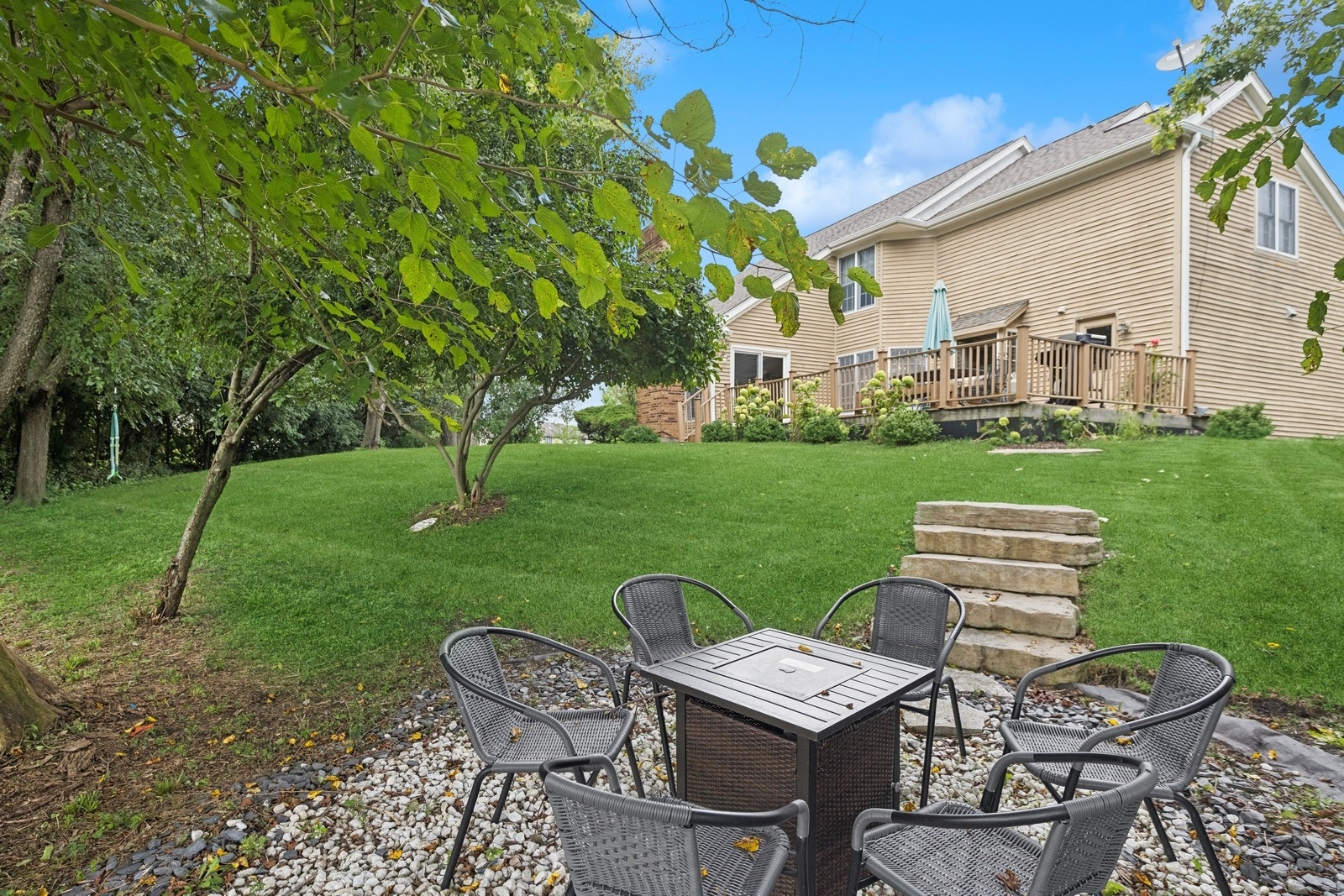 1531 Pinehurst Drive Darien, IL 60561 - Photo 31 of 38 a view of a chairs and table in backyard of the house