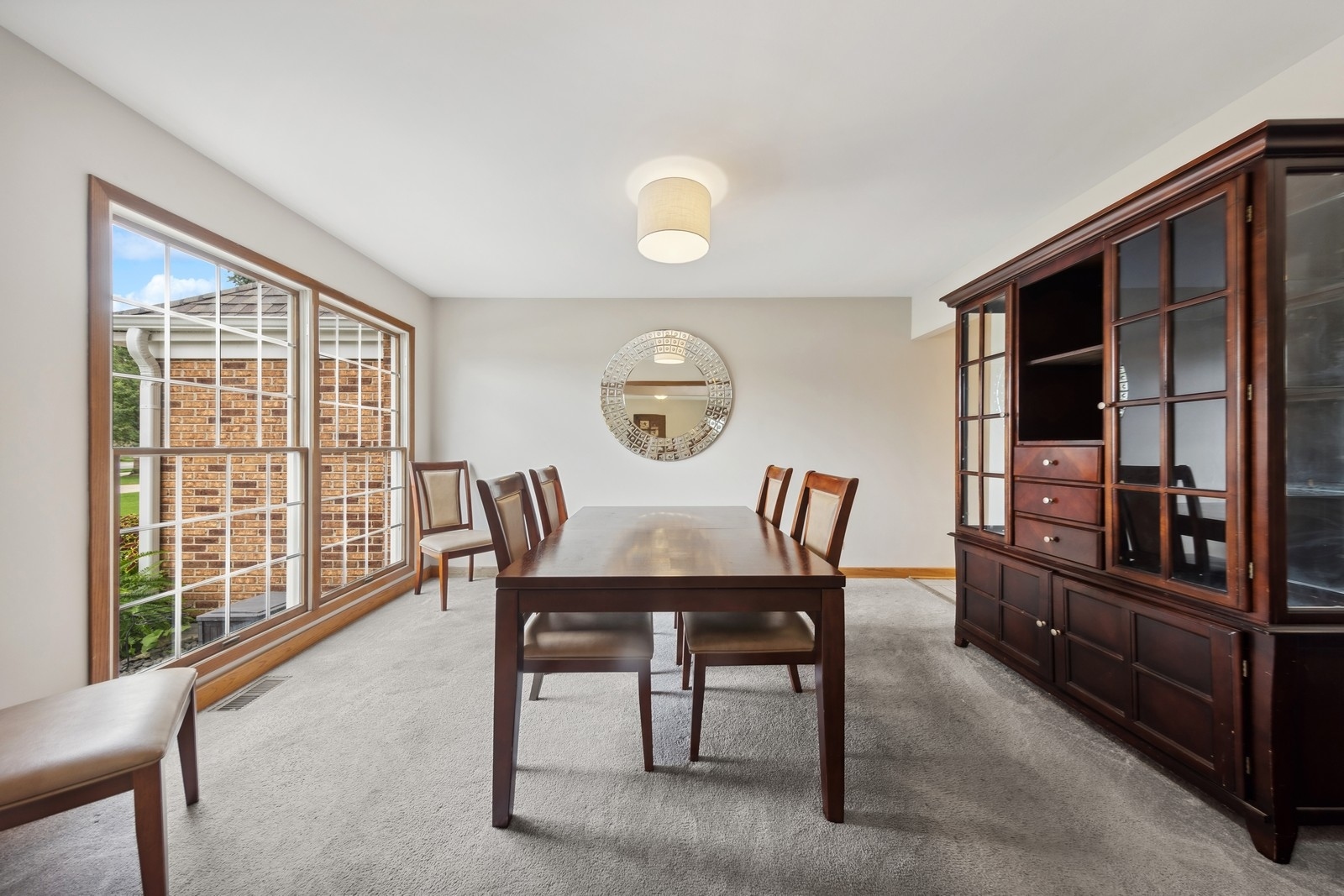 1531 Pinehurst Drive Darien, IL 60561 - Photo 4 of 38 a view of a dining room with furniture window and outside view