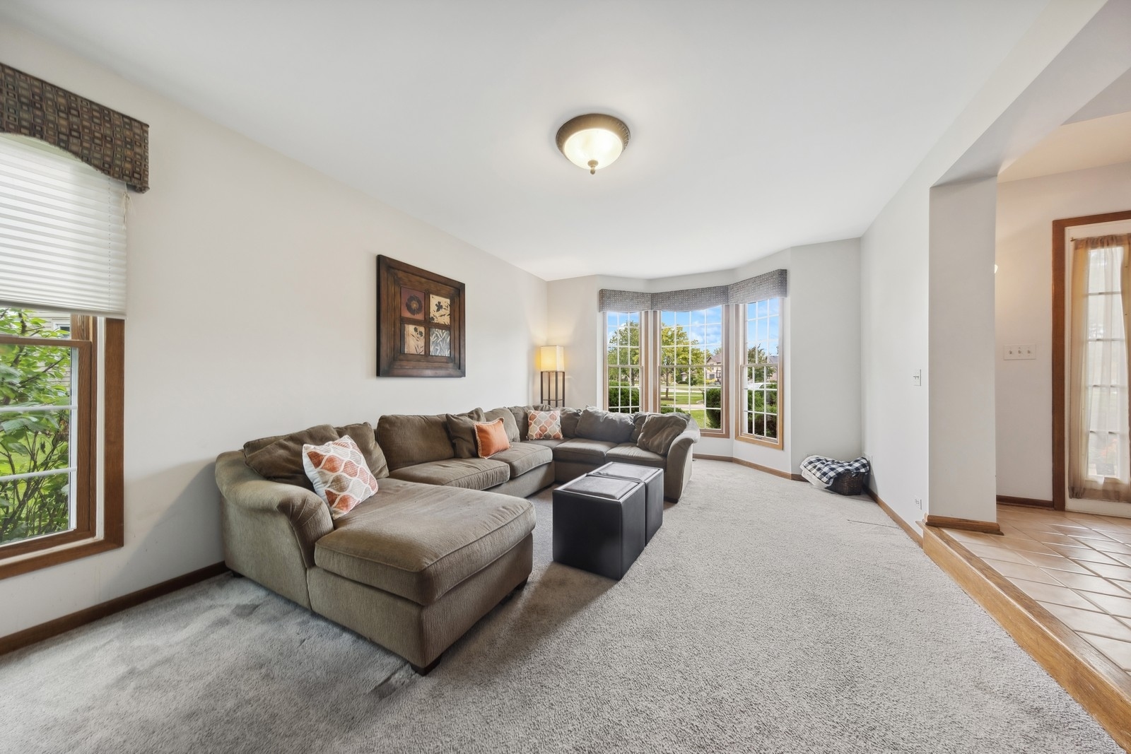 1531 Pinehurst Drive Darien, IL 60561 - Photo 6 of 38 a living room with furniture and a window