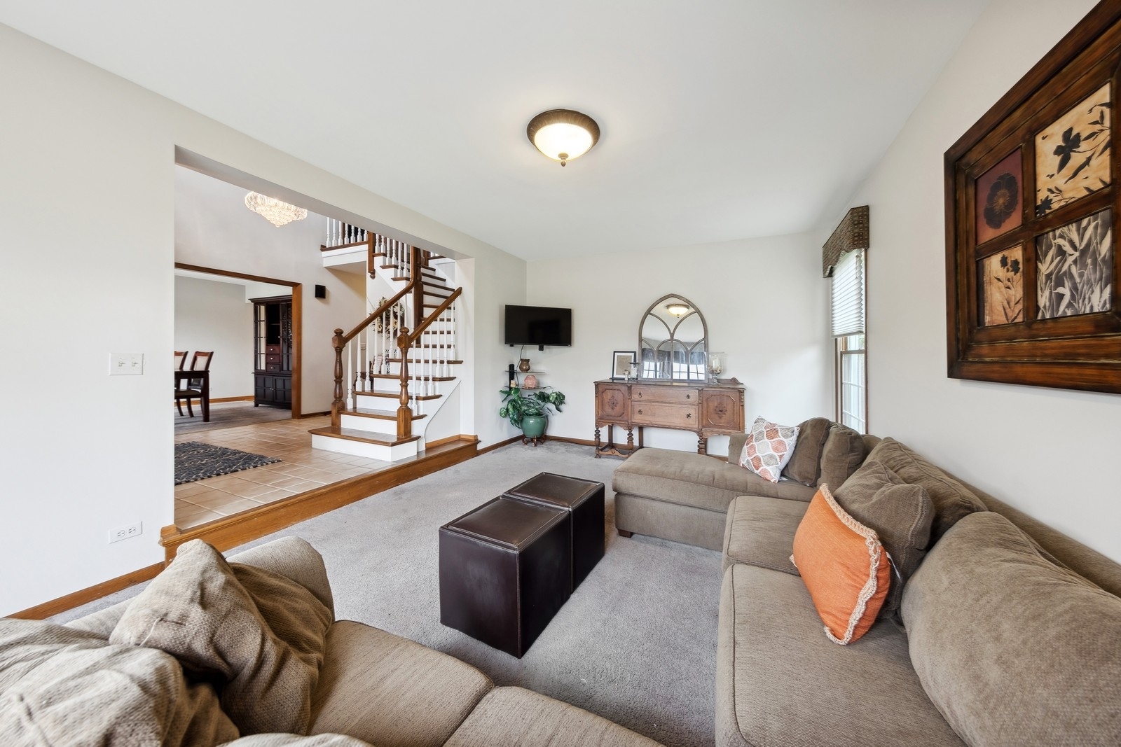 1531 Pinehurst Drive Darien, IL 60561 - Photo 7 of 38 a living room with furniture and a table