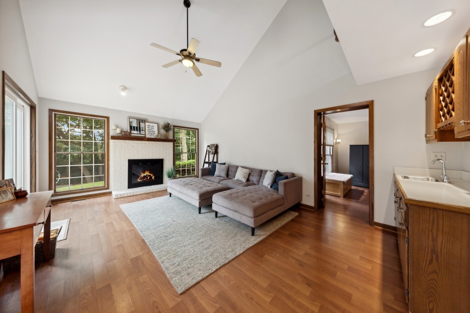 1531 Pinehurst Drive Darien, IL 60561 - Photo 9 of 38 a living room with furniture and a fireplace