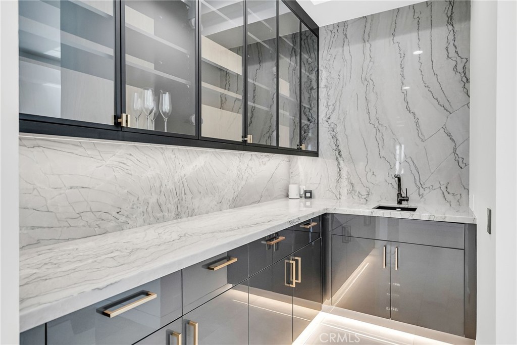 2130 Old Quarry Road Riverside, CA 92506 - Photo 21 of 75 a kitchen with a sink and cabinets