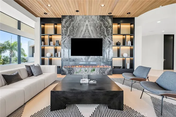 a living room with furniture and a couch