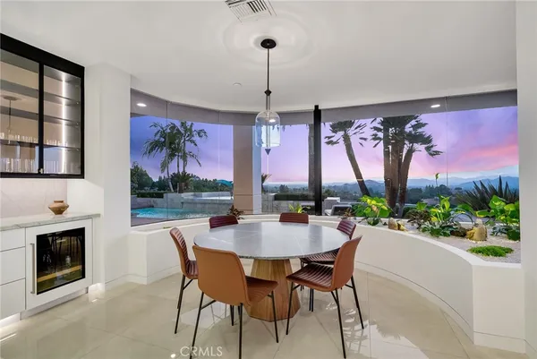 a kitchen with stainless steel appliances a sink a stove and a microwave