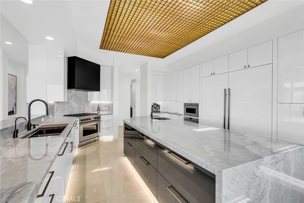a bathroom with a double vanity sink and mirror
