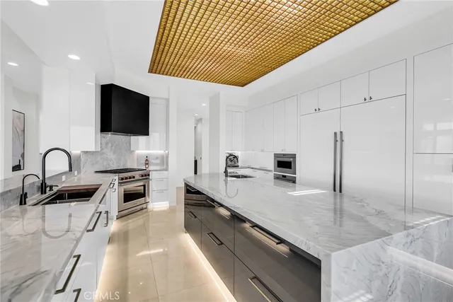 a bathroom with a double vanity sink and mirror