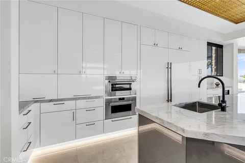 a bathroom with a bathtub a sink a mirror and a shower