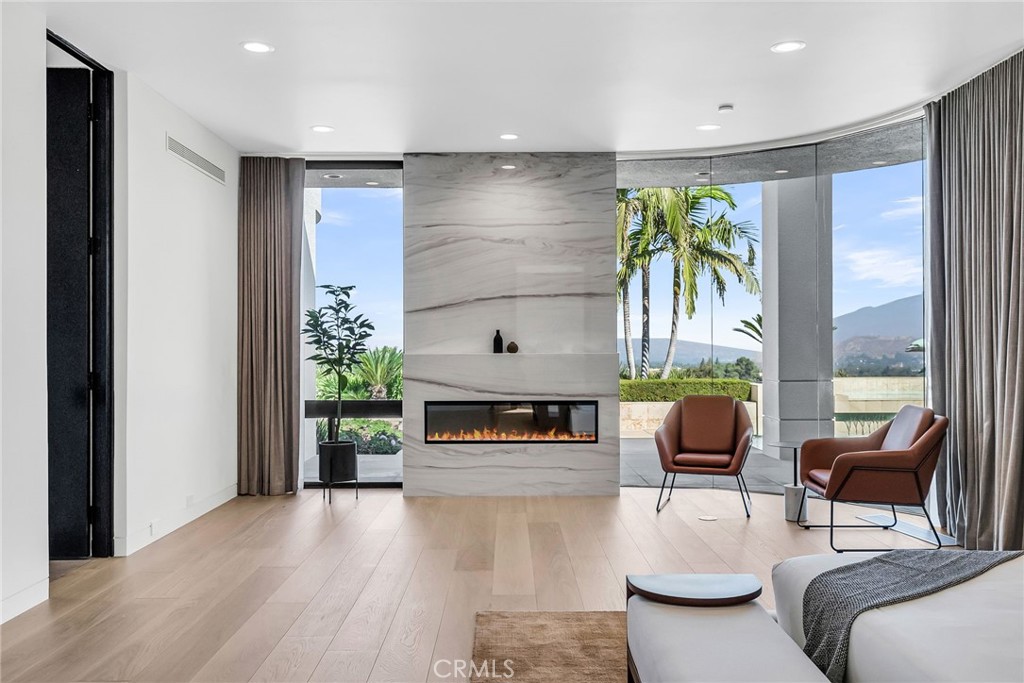2130 Old Quarry Road Riverside, CA 92506 - Photo 42 of 75 a living room with furniture and a fireplace