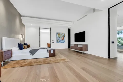 a bathroom with a shower sink and mirror