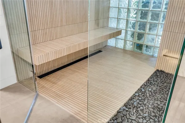 a swimming pool with outdoor seating and yard