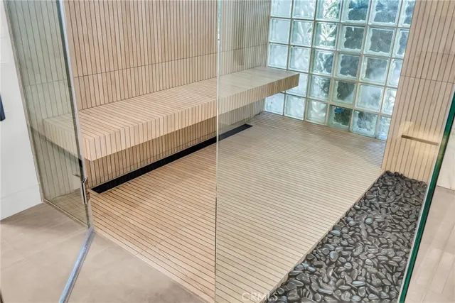 a swimming pool with outdoor seating and yard