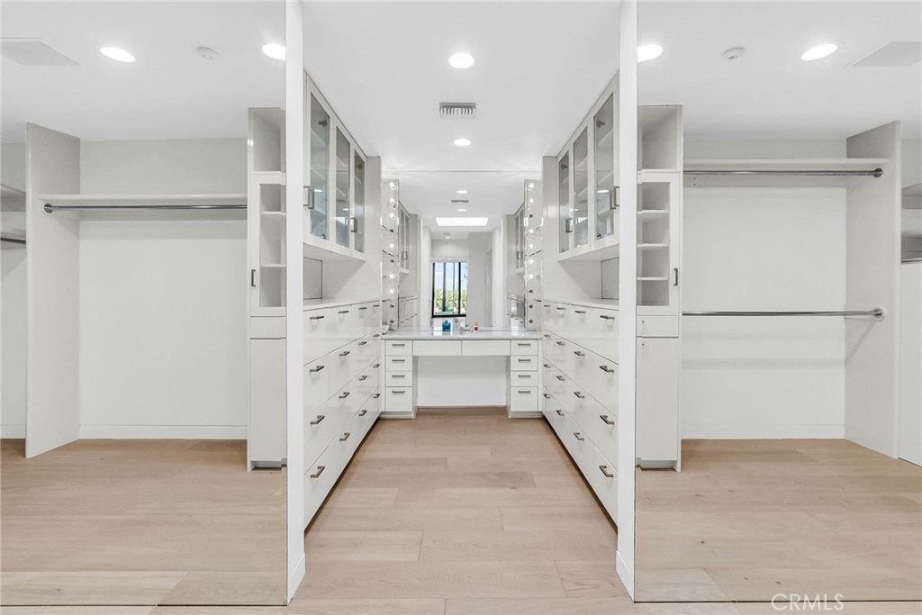 2130 Old Quarry Road Riverside, CA 92506 - Photo 49 of 75 a bathroom with a double vanity sink and mirror