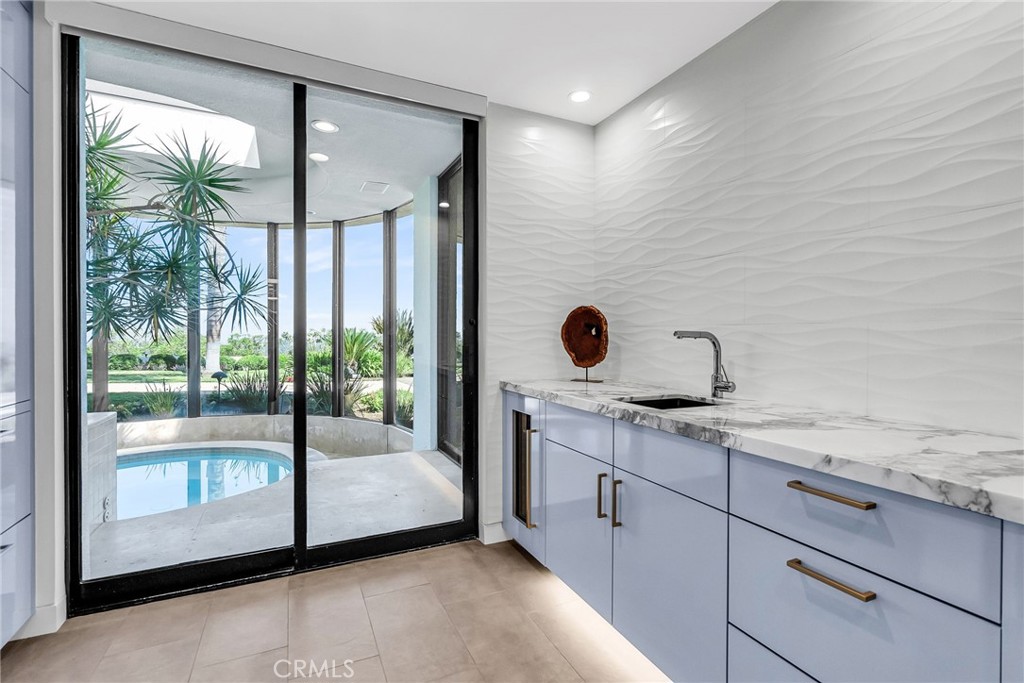 2130 Old Quarry Road Riverside, CA 92506 - Photo 50 of 75 a spacious bathroom with a granite countertop sink and mirror