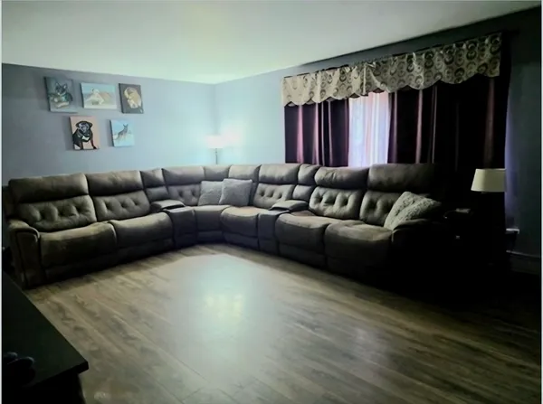 a living room with furniture and a couch