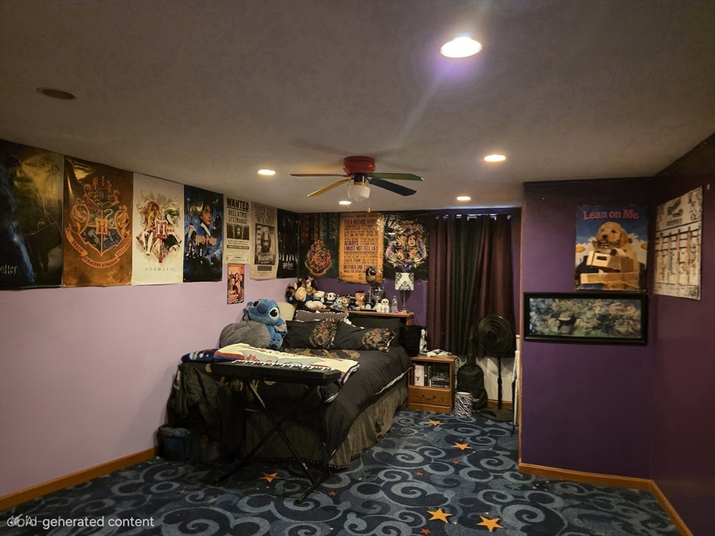 43 Emily Jeffers Road, Unit 43 Randolph, MA 02368 - Photo 25 of 31 a living room with furniture and a flat screen tv