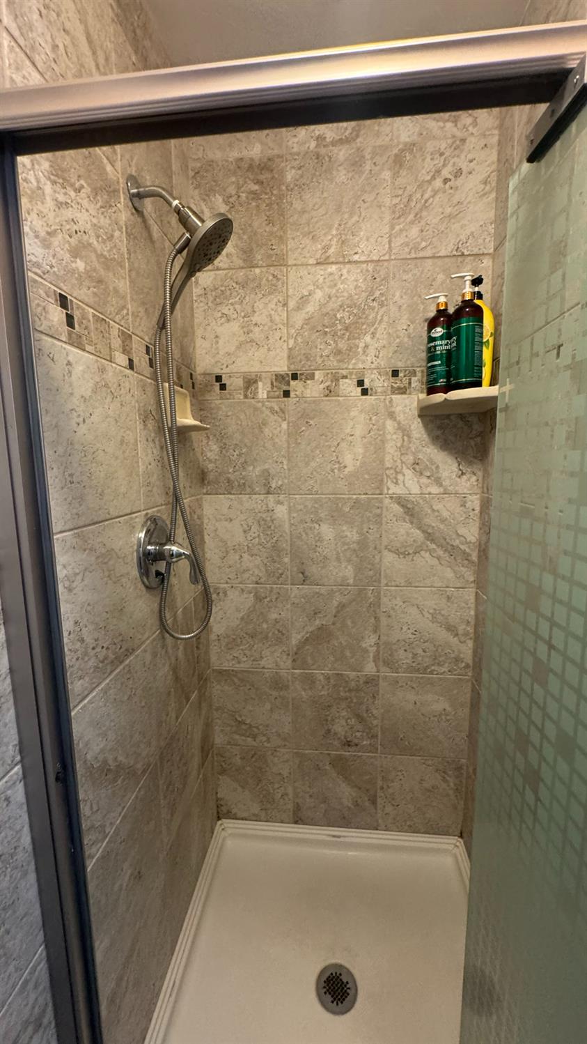 31160 Revis Road Coarsegold, CA 93614 - Photo 12 of 15 a bathroom with a shower