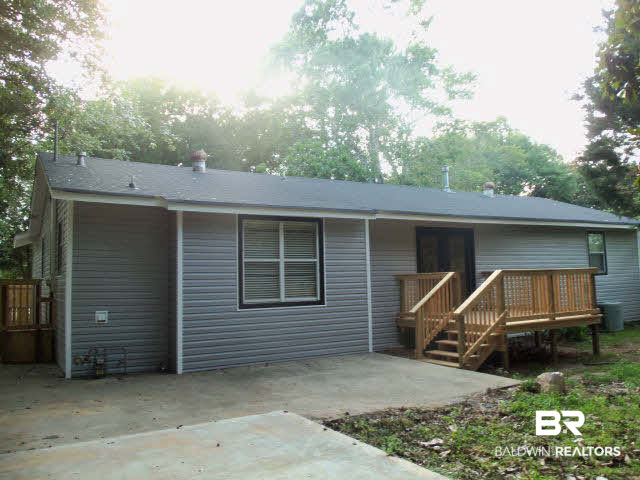 18568 South Greeno Road Fairhope, AL 36532 - Photo 18 of 22 EXTRA CEMENT AREA FOR PATIO/GRILLING OR BASKETBALL GAME.