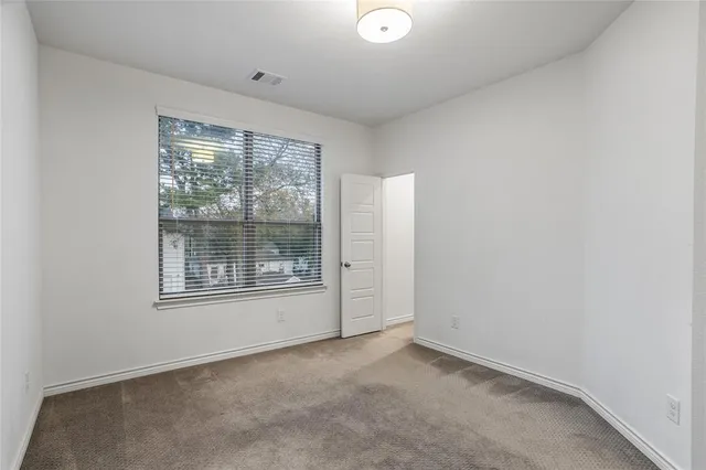 an empty room with window