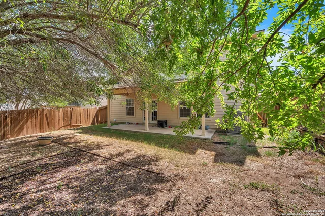 a building outdoor space with glass windows and couch