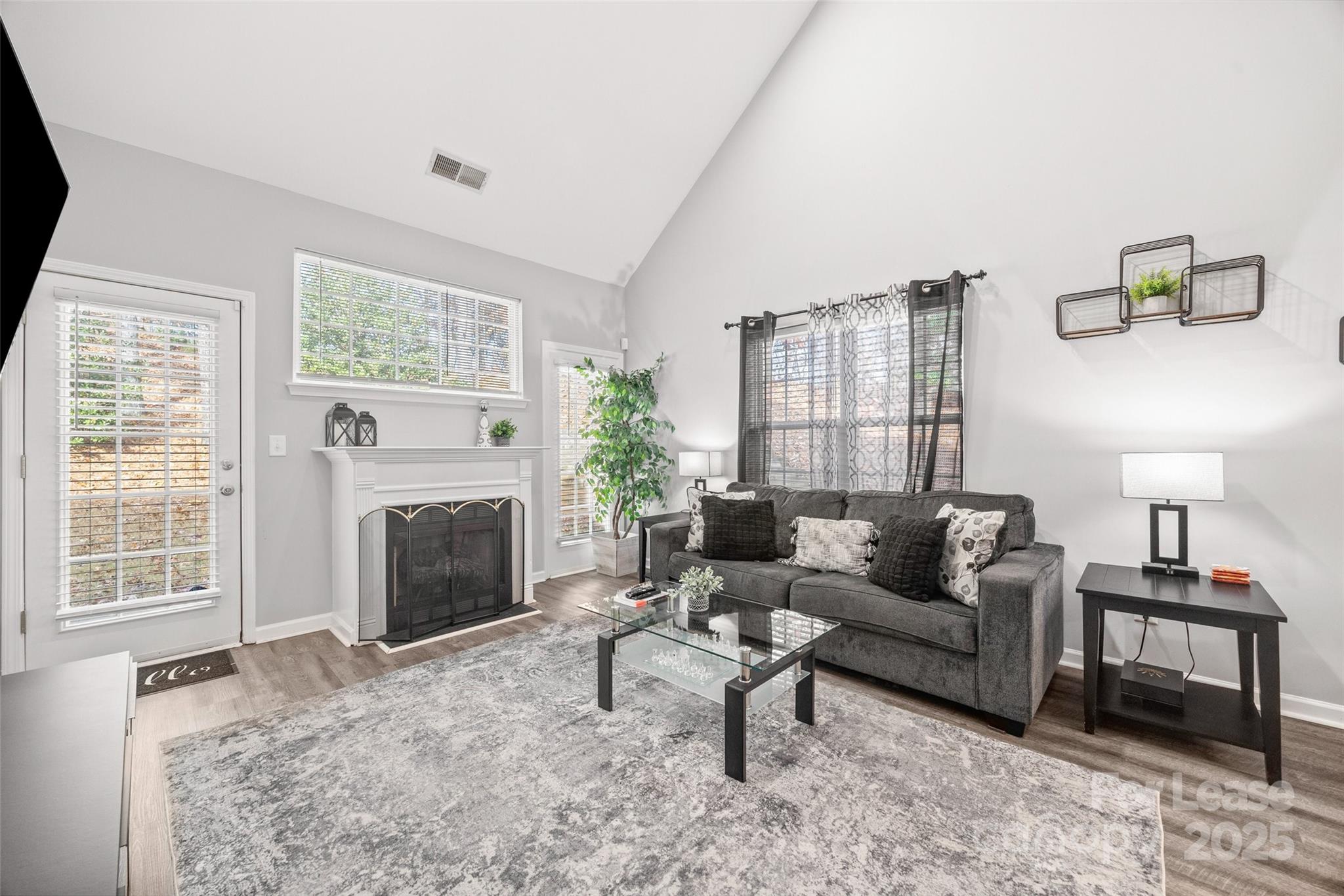 16865 Timber Crossing Road Charlotte, NC 28213 - Photo 11 of 39 a living room with furniture and a fireplace