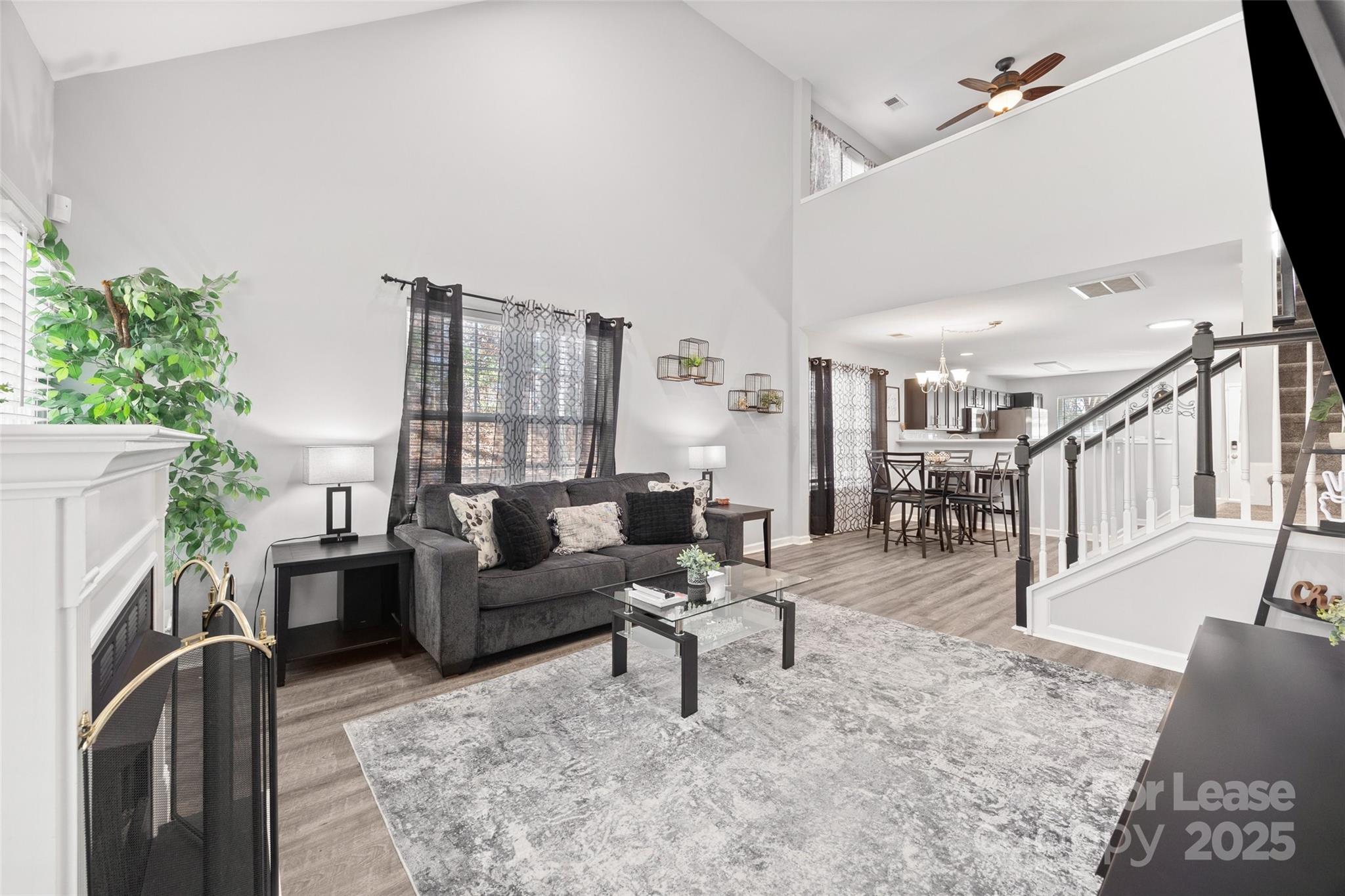 16865 Timber Crossing Road Charlotte, NC 28213 - Photo 12 of 39 a living room with furniture and a fireplace