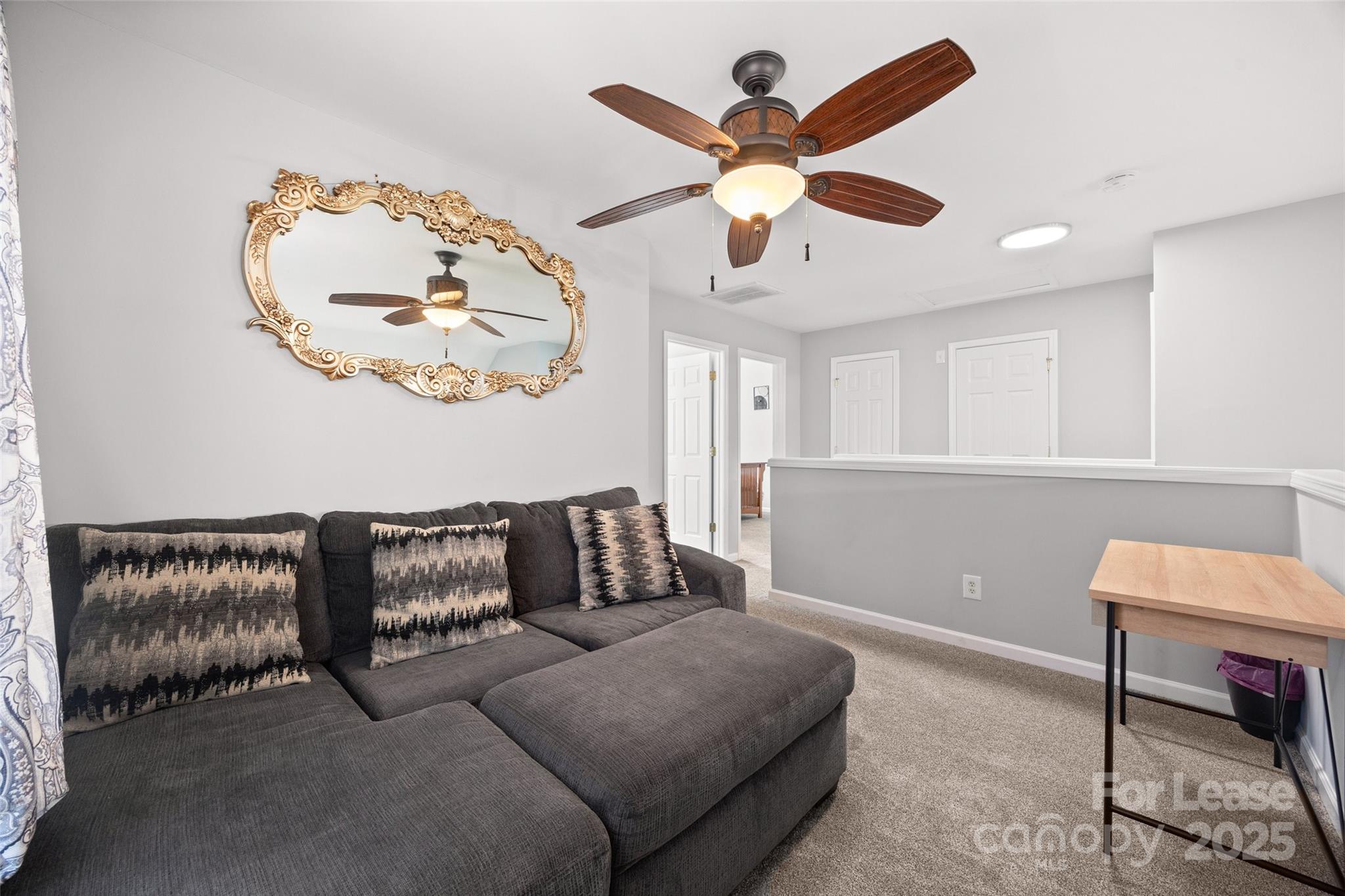 16865 Timber Crossing Road Charlotte, NC 28213 - Photo 20 of 39 a living room with furniture and a window