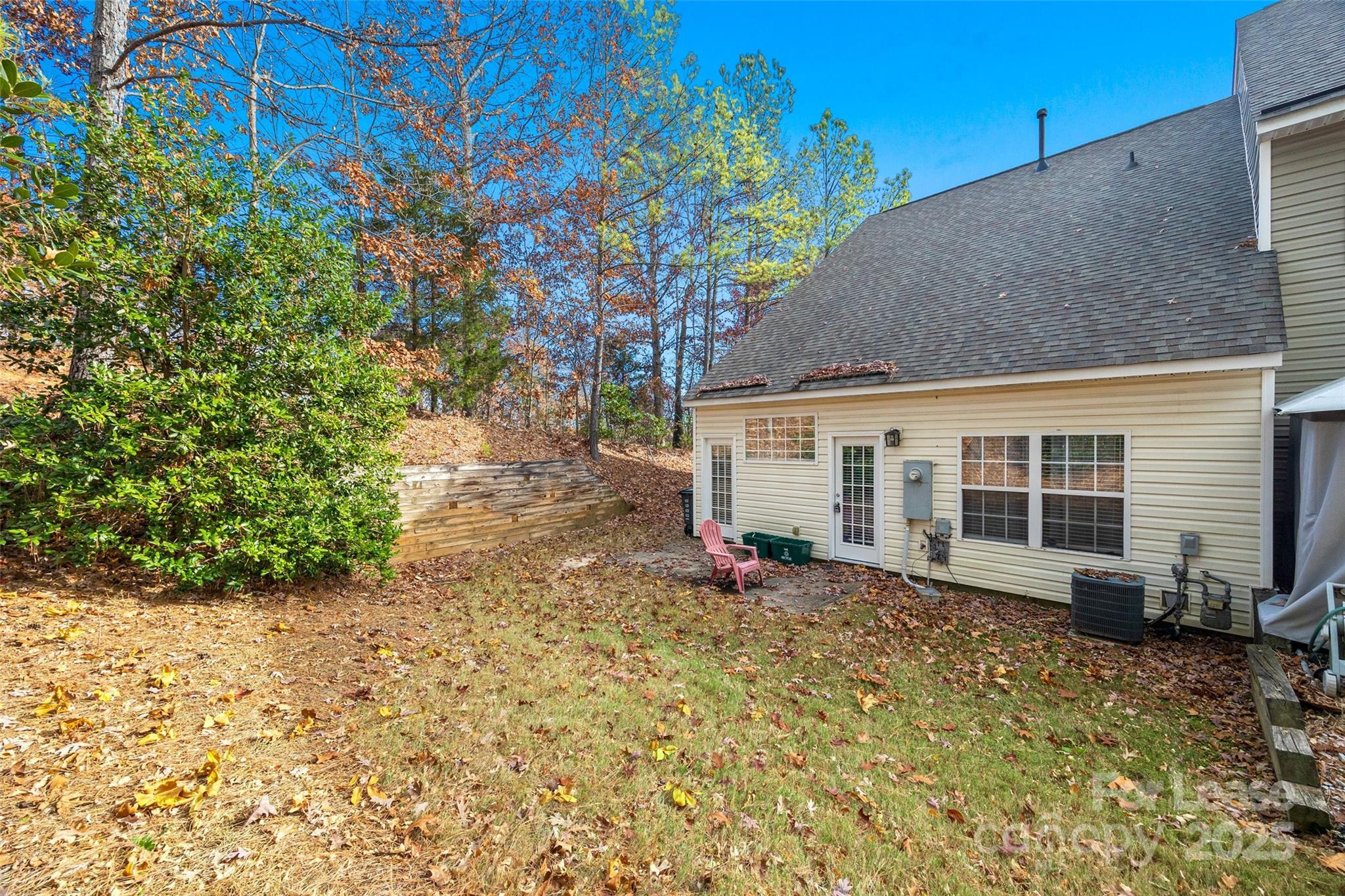 16865 Timber Crossing Road Charlotte, NC 28213 - Photo 27 of 39 a view of a house with a yard
