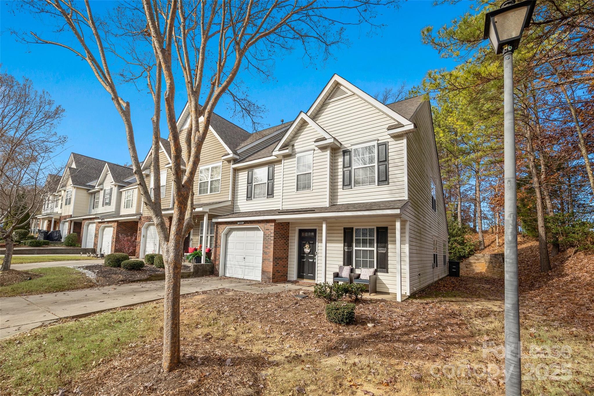 16865 Timber Crossing Road Charlotte, NC 28213 - Photo 28 of 39 a front view of a house with a yard