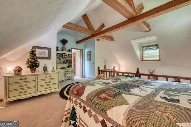 a bathroom with a toilet sink and a shower curtain